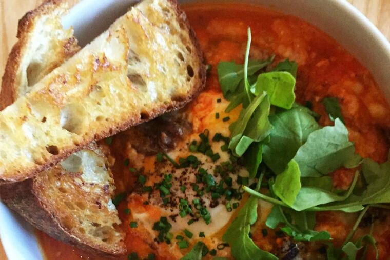 Baked Italian eggs with braised short ribs and white beans from Tria Fitler Square.