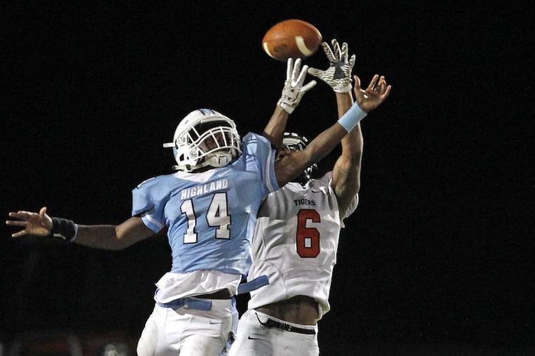 Kasim Randall-Dale (left 14), ehre last seasonvs. Woodrow Wilson, and the Highland Tartans meet Winslow Twp. in a key game Friday.