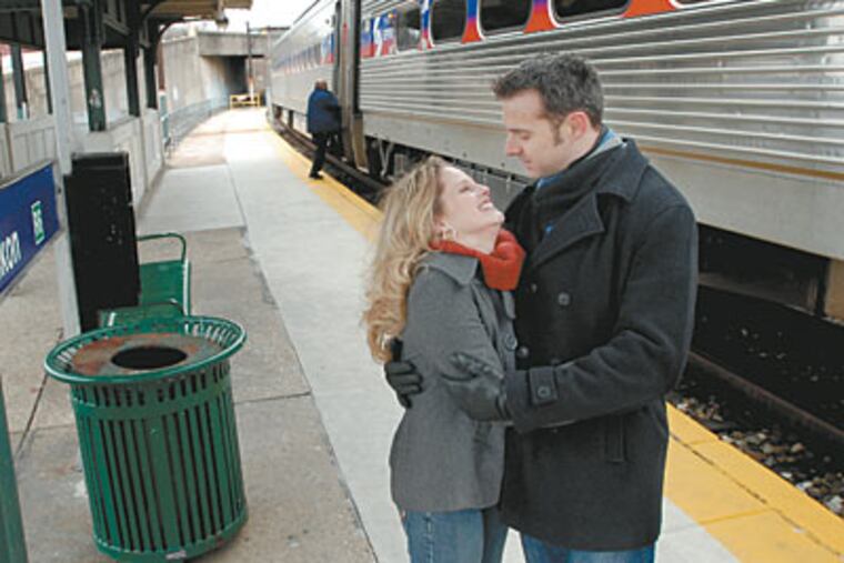 Jason and Jennifer Ganister met on the R6 platform. He kept giving her newspapers — and the rest is the stuff of a prize “Valentine’s Day” story. (APRIL SAUL / Staff Photographer)