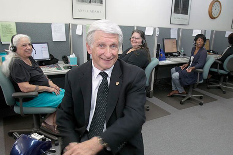 Tony Greenfield,72, sits with employees answering telephone in Maple Shade, NJ. ( AKIRA SUWA / Staff Photographer )