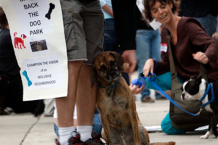 A pooped pooch at a Friday rally protesting the closing of a Corinthian Avenue dog run. Neighbors had complained.