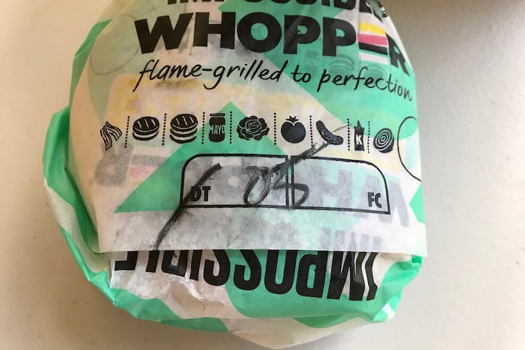 The Impossible Whopper is now offered at Burger King locations throughout South Florida, part of a nationwide roll out. It's one of many meatless products enticing consumers. (Michael Mayo/Sun Sentinel/TNS)