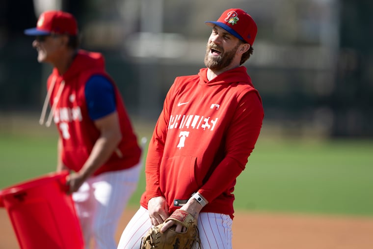 Phillies' Bryce Harper (right) only saw pitches in the zone 43% of the time last year.