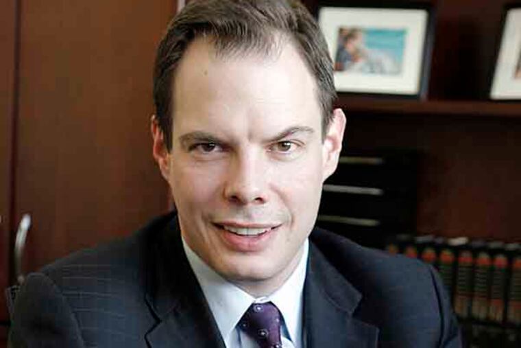 Jim Francis, a Center City lawyer who specializes in representing consumers with credit-report problems and related matters such as ID theft is posing for photo at his center city office. 01/29/2009 (Akira Suwa / Staff Photographer ). EDITORS NOTE : QNAFRANCIS02-B 108009 AS ---- Q&A with Jim Francis, a Center City lawyer who specializes in representing consumers with credit-report problems and related matters such as ID theft.