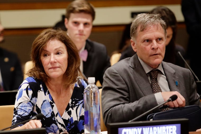 In this May 3, 2018, file photo, Fred Warmbier, right, and Cindy Warmbier, parents of Otto Warmbier, wait for a meeting at the United Nations headquarters.