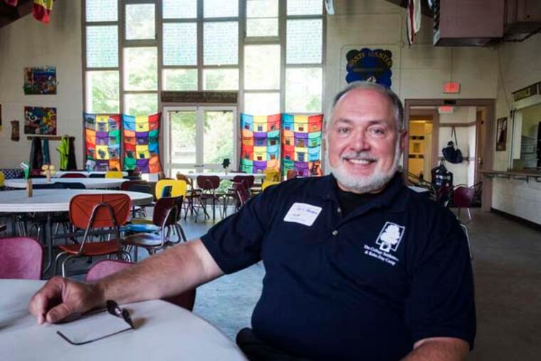 Chris Weinrich, a retired insurance exec who took on the job of interim director of the College Settlement camp for disadvantaged youth. (ED HILLE/Staff Photographer)