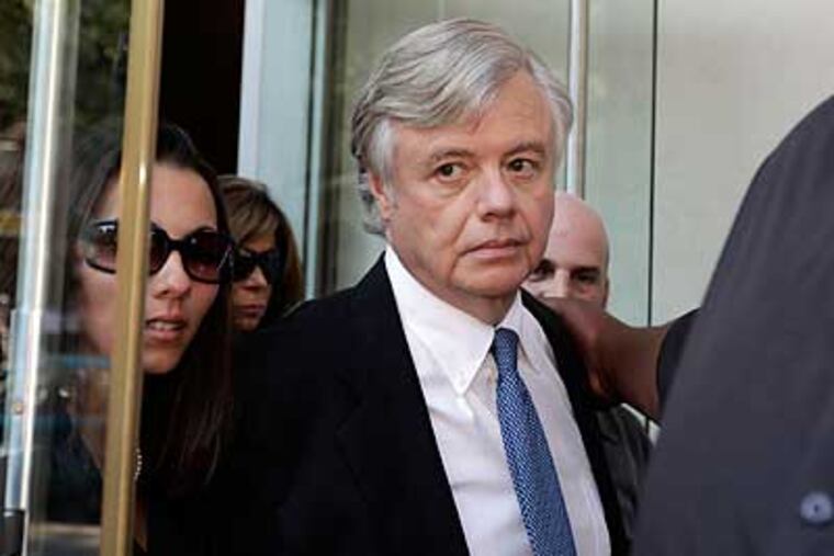 FILE - In this Tuesday, July 14, 2009 file photo, former state Sen. Vincent Fumo exits the U.S. Courthouse in Philadelphia. A U.S. appeals court on Tuesday, Aug. 23, 2011 threw out the 4 1/2-year corruption sentence of the long-powerful former Pennsylvania state senator. (AP Photo/Matt Rourke)