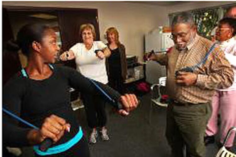 Brittany Wright directs exercise class as part of diabetes-prevention program at Jefferson. ( ALEJANDRO A. ALVAREZ / Staff photographer )