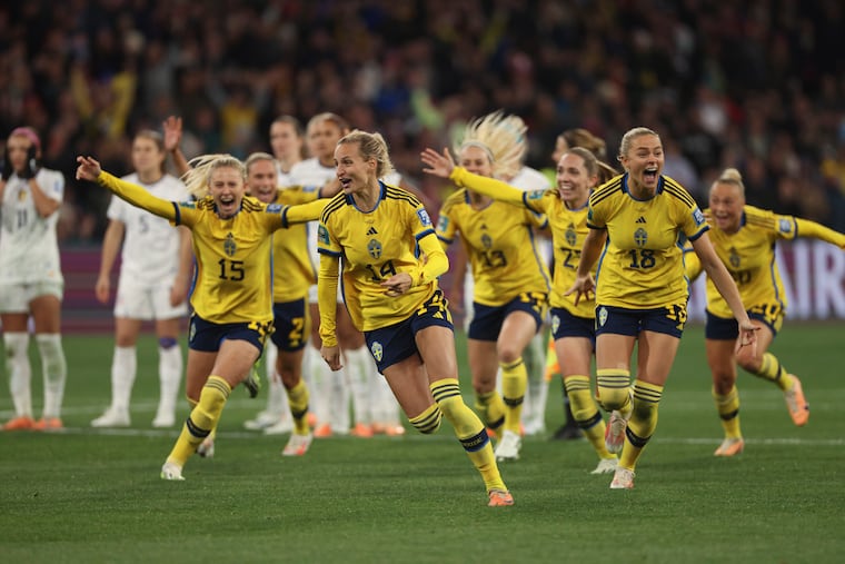 Sweden's team celebrate after defeating the United States in a penalty shootout in their Women's World Cup round of 16 soccer match in Melbourne, Australia, Sunday, Aug. 6, 2023.