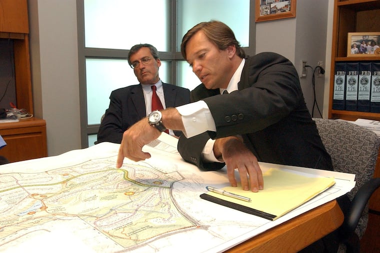 Jerrehian family attorney Lewis Colagreco (left) and Ray Grochowski Jr., director of land entitlements for Pulte Homes, discuss a development proposal at Greystone Hall in 2005. That plan later fell through as the recession hit and Pulte pulled out of the deal.