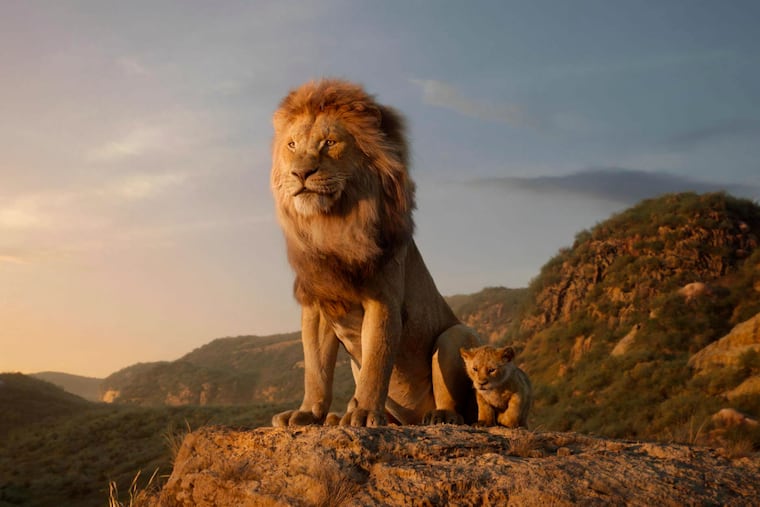 This image released by Disney shows characters, from left, Mufasa, voiced by James Earl Jones, and young Simba, voiced by JD McCrary, in a scene from "The Lion King."
