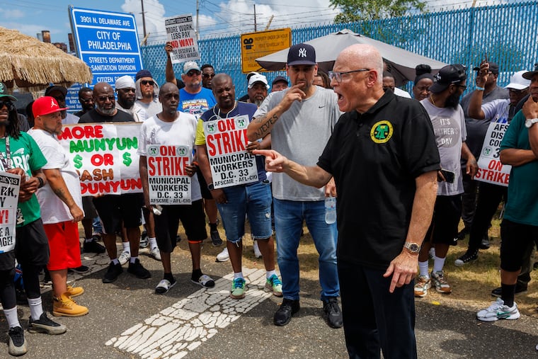 AFSCME National President Lee Saunders speaks to members of AFSCME District Council 33 at picket in Philadelphia during the union's strike in July.