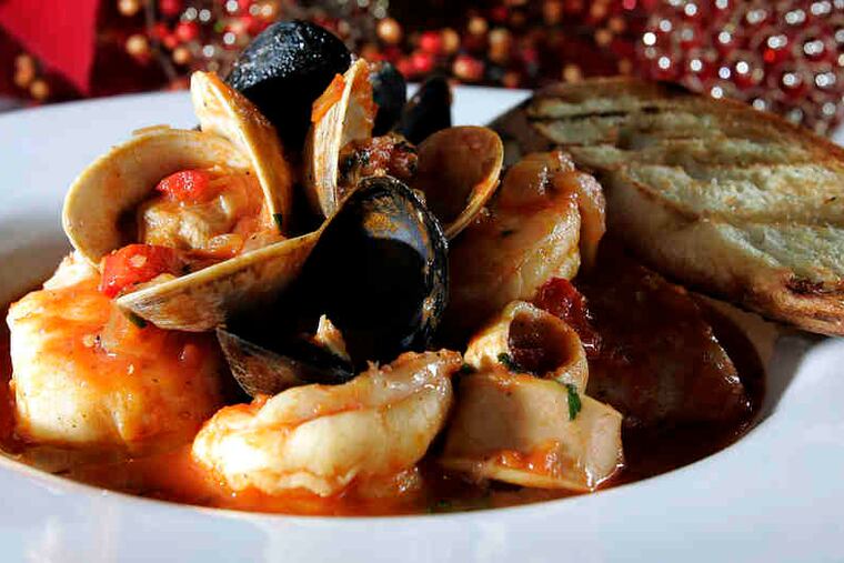 Cioppino has wine-and-garlic-rich tomato sauce, assorted fish and/or shellfish.