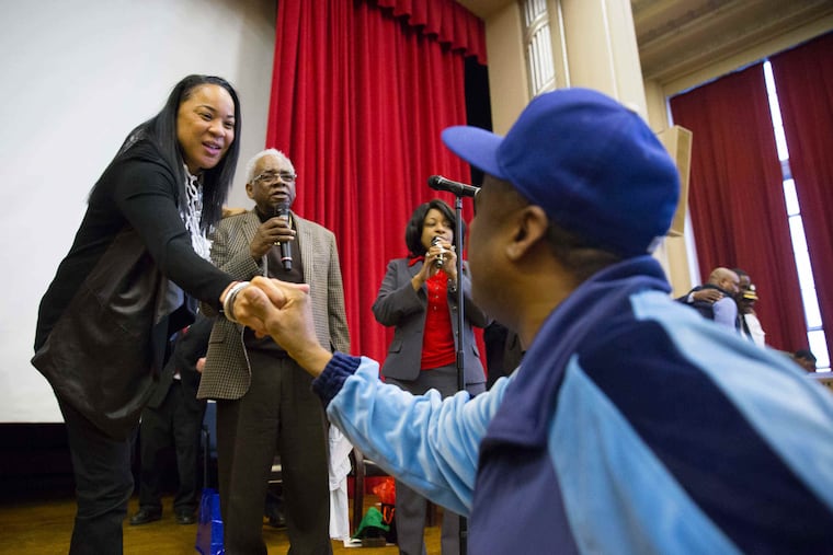 South Carolina women's basketball coach and Dobbins grad Dawn Staley greets a fan at the high school on April 6, 2017.