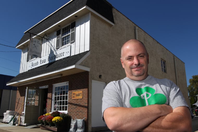 Stephen Allen, store manager for the past 20 years, stands before the small Jacob Low hardware store on West Chester Pike in Havertown, PA. No one would ever confuse it with Lowe's, but the Jacob Low hardware store in Haverford has been a community axis for decades. Now it is fighting to stay in business. Jacob Low, a throwback hardware store in Delco, fights for survival with Stephen Allen it's store manager for the past 20 years. (MICHAEL BRYANT / Staff Photographer)