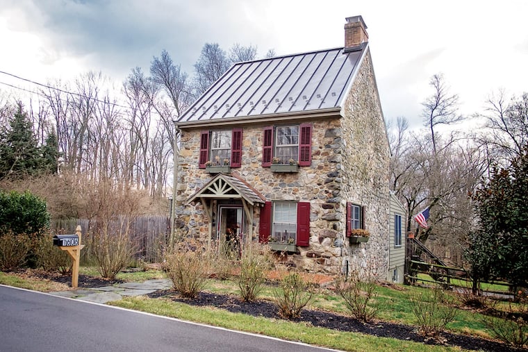 The farmhouse that Bob Egan purchased in 1985 had endured years of abuse. The fieldstone was revealed after a plaster façade was removed.