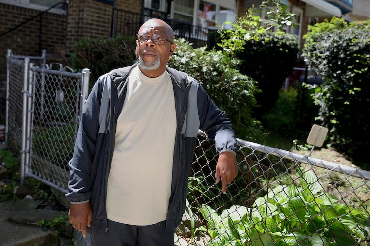 Gregory Benjamin, the Democratic leader of the 51st Ward, stands for at his home in Southwest Philadelphia in 2021. Benjamin hopes to clear the air about the flier posted of KKK members in his neighborhood.