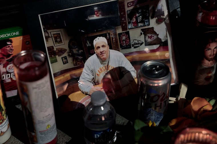 A memorial on the front step of Big Charlie's Saloon on Wednesday shows a photo of owner Paul Staico, who died on Sunday.