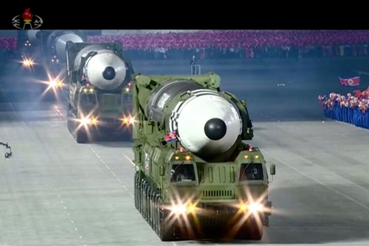 This image made from video broadcast by North Korea's KRT shows a military parade with what appears to be a possible new solid-fuel missile at the Kim Il Sung Square in Pyongyang on Saturday.