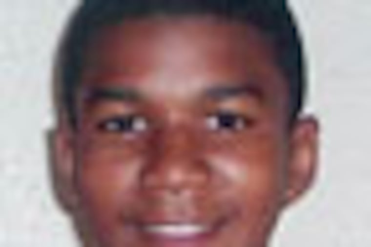 FILE - This undated file family photo shows Trayvon Martin. Martin was slain in the town of Sanford, Fla., on Feb. 26 in a shooting that has set off a nationwide furor over race and justice. Neighborhood crime-watch captain George Zimmerman claimed self-defense and has not been arrested, though state and federal authorities are still investigating. Since the slaying, a portrait has emerged of Martin as a laid-back young man who loved sports, was extremely close to his father, liked to crack jokes with friends and, according to a lawyer for his family, had never been in trouble with the law. (AP Photo/Martin Family, File)