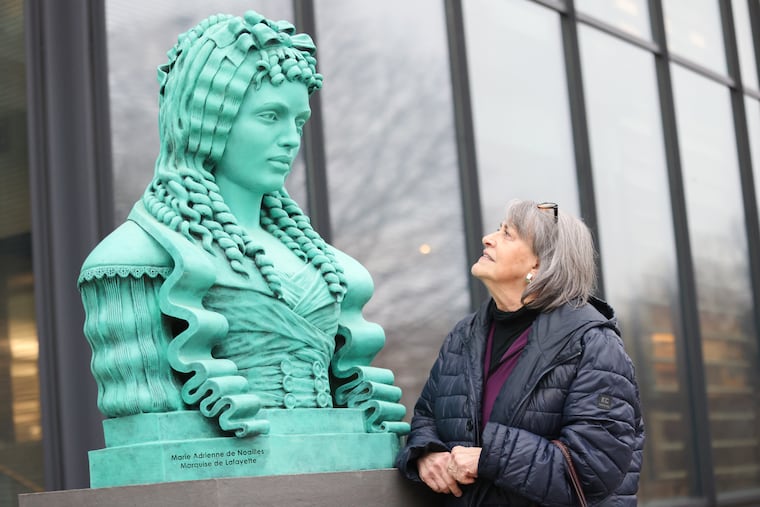 The author, the archivist emeritus of Lafayette College, views a bust of Adrienne Françoise de Noailles, the wife of the Revolutionary War hero, Marquis de Lafayette.
