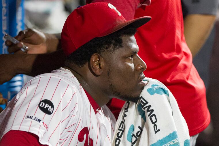 Hector Neris of the Phillies sits in the dugout after giving up the go ahead run to the Red Sox in the 9th inning at Citizens Bank Park on Sept. 14, 2019. The Red Sox won 2-1.