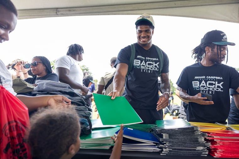 Jihaad Campbell held a back-to-school event, handing out backpacks and school supplies to kids in his community at the Gloucester Township Community Park on Saturday.