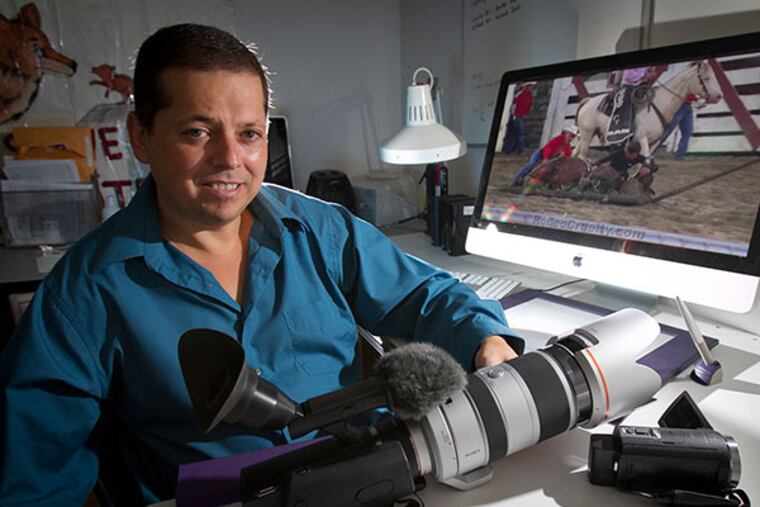 Stuart Chaifetz of Cherry Hill, NJ at his home on Monday, September 23, 2013. Chaifetz is an animal rights investigator for SHARK, Showing Animals Respect and Kindness. On monitor is a still from a video he did on a dead horse being carted away at a rodeo. ( ALEJANDRO A. ALVAREZ / STAFF PHOTOGRAPHER )