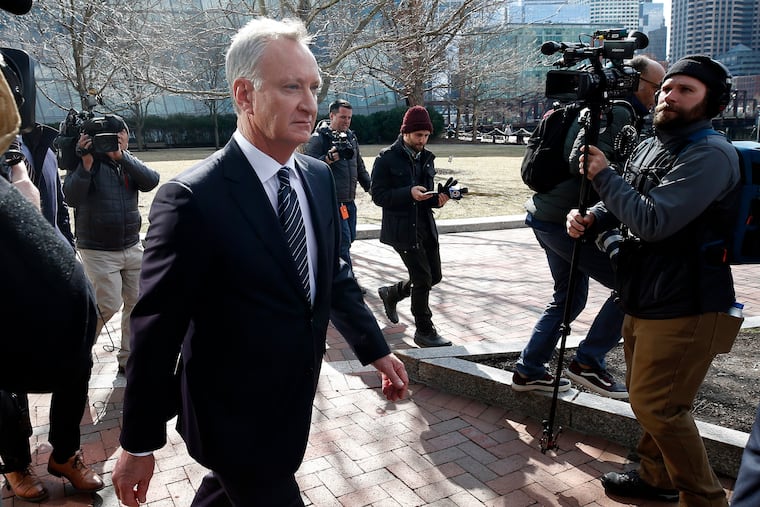 FILE - In this April 3, 2019, file photo, TobyMacFarlane departs federal court in Boston after facing charges in a nationwide college admissions bribery scandal. Authorities said Tuesday, April 23, that MacFarlane, a former senior executive at a title insurance company, will plead guilty to racketeering conspiracy and cooperate with federal authorities in the case.