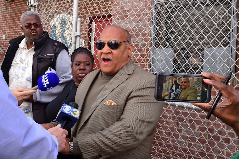 Pastor and former mayoral candidate Rev. Amir Khan (right), community activist and blogger Vida Neil (center) and Camden County NAACP president Kevin Barfield (left) hold a news conference outside the Camden Board of Education after meeting with acting superintendent Katrina McCombs. They reacted to the possibility of the school district closing two schools and an annex, cutting 300 jobs and relocating about 900 students to help close a $27 million budget deficit.