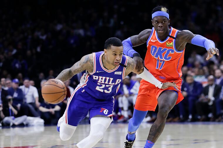 Sixers guard Trey Burke dribbling past Oklahoma City Thunder guard Dennis Schroder on Monday.