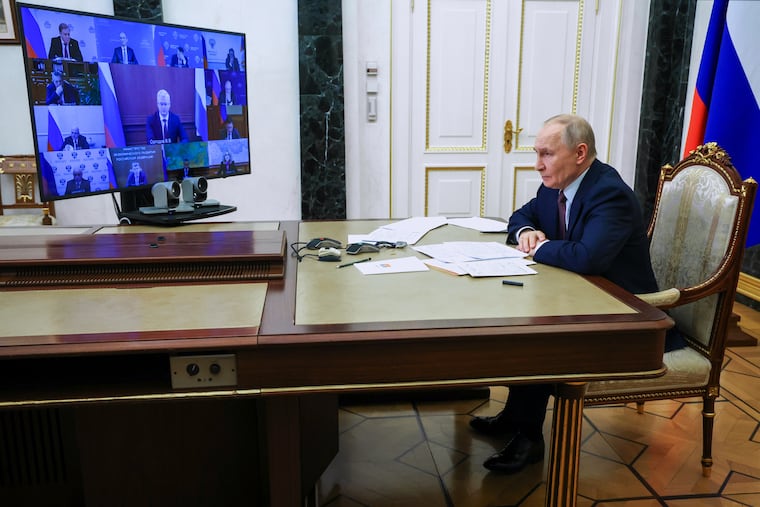 Russian President Vladimir Putin attends a cabinet meeting via video-conference at the Kremlin, in Moscow on Wednesday. Putin said he is not surprised by the U.S. push for Greenland.