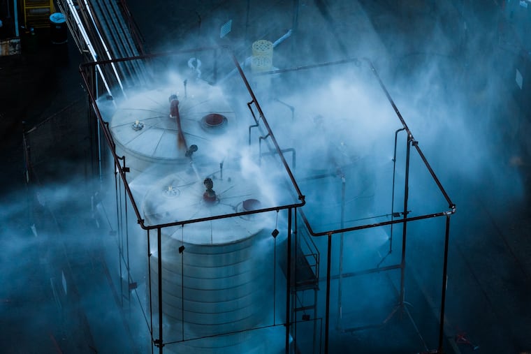 Water is sprayed on a tank that overheated at an aerospace plant in Garden Grove, Calif., Friday, May 22, 2026.