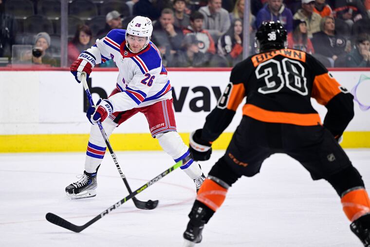 New York Rangers' Jimmy Vesey (26) takes a shot to score a goal during the third period between the Flyers and Rangers on Saturday.