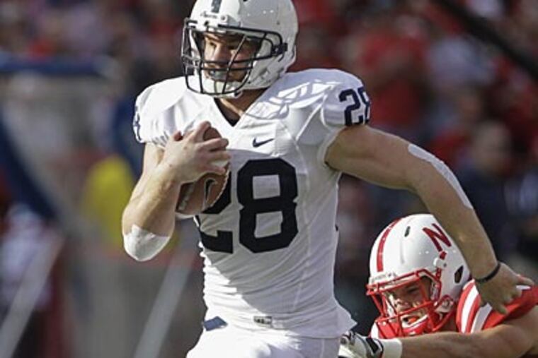Penn State's Zach Zwinak (28) runs for a touchdown past Nebraska's
Sean Fisher (42) and Alonzo Whaley (45) in the first half of an NCAA
college football game in Lincoln, Neb., Saturday, Nov. 10, 2012. (AP
Photo/Nati Harnik)