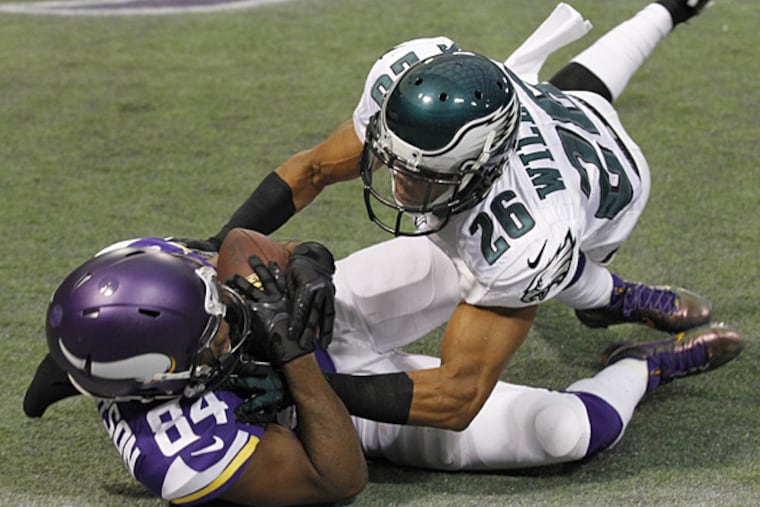 Vikings wide receiver Cordarrelle Patterson catches a five-yard touchdown pass in front of Eagles cornerback Cary Williams during the second half. (Ann Heisenfelt/AP)