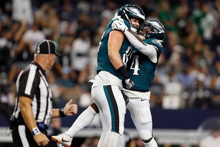Philadelphia Eagles tight end Dallas Goedert and Philadelphia Eagles running back Kenneth Gainwell celebrate Goedert’s touchdown in the second quarter while playing the Dallas Cowboys on Sunday, Nov. 10, 2024, in Arlington,TX.