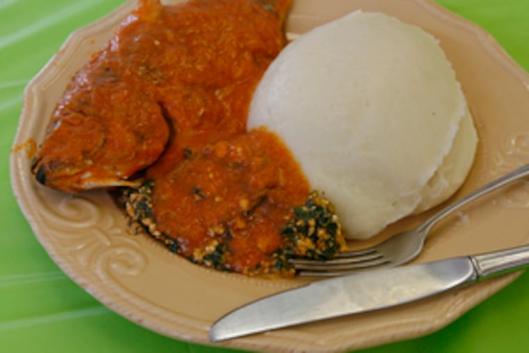 Starchy fufu, fish and greens at Wazobia - "come in" in three languages.