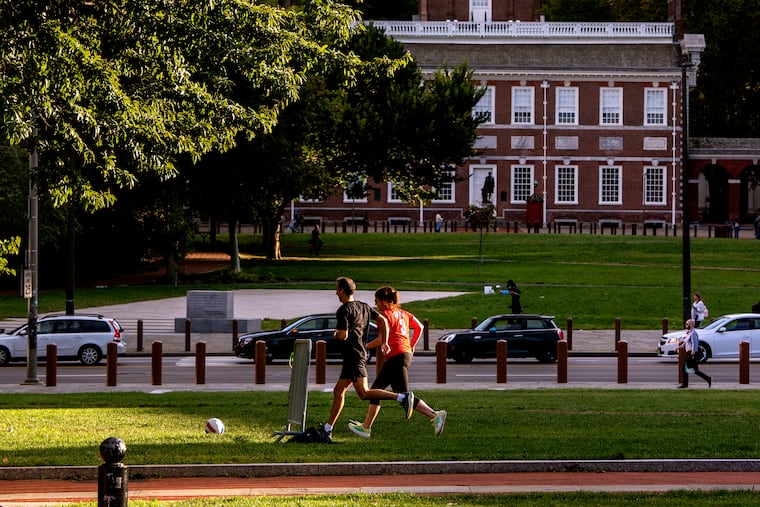 October 3, 2022: Alex Hiznay and Gabby Rybicki (right) play some one-on-one soccer on Independence Mall.