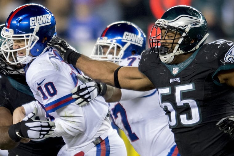 Giants QB Eli Manning was pressured by Brandon Graham and Fletcher Cox last season. Both could be in his face Sunday. CLEM MURRAY / Staff Photographer