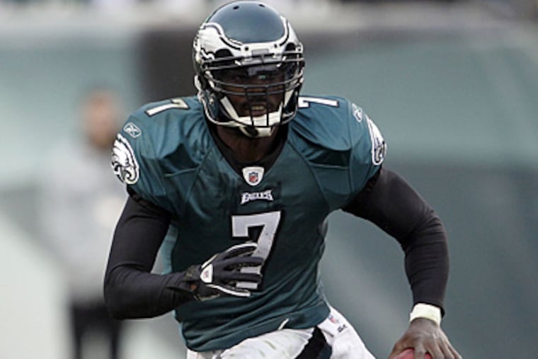 Michael Vick's stats per game decreased in every major category last season. (Yong Kim/Staff Photographer)