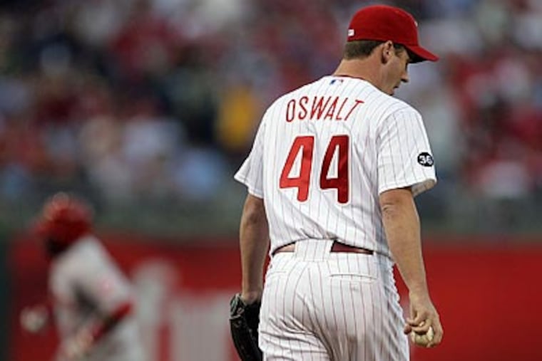 Roy Oswalt allowed four runs, three earned, in five innings during Game 2 of the NLDS. (Yong Kim/Staff Photographer)