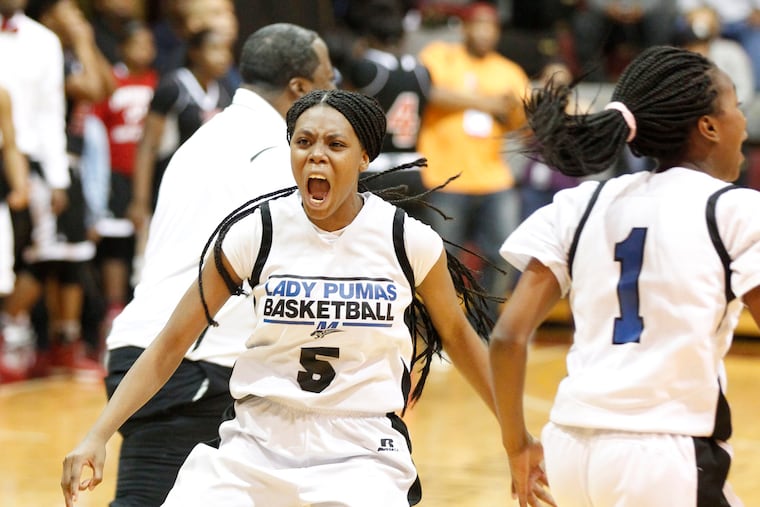 Nahemiah Johnson (left) and Alanis Hill of Mastery North celebrate after their 57-55 victory over Imhotep at St. Joseph’s University on Feb. 23, 2017 in the girls Philadelphia Public League Championship game. CHARLES FOX / Staff Photographer