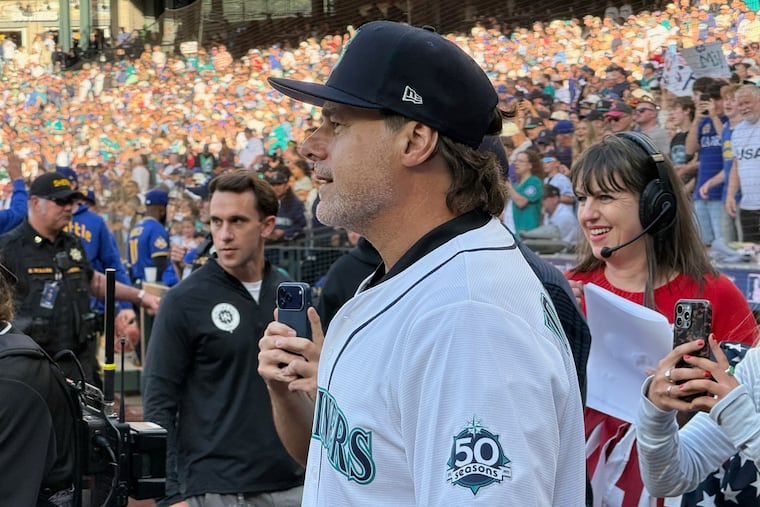 U.S. men's soccer team manager Mauricio Pochettino taking in the scene after throwing out the ceremonial first pitch at the Seattle Mariners game on Friday.