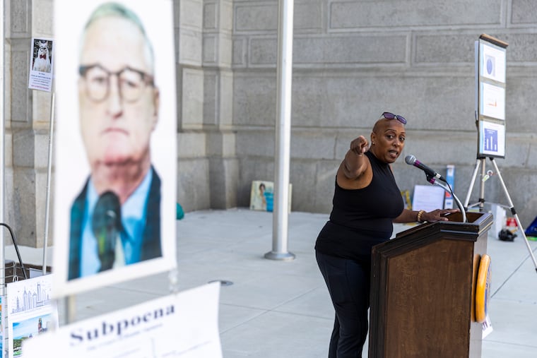 Tonya Bah, an activist with Philadelphia Neighborhood Networks, criticizes Mayor Jim Kenney for declining to establish the Philadelphia Public Finance Authority, which City Council authorized in March.