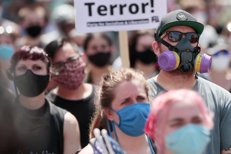 Protesters at Dilworth Park after marching around the city during The People Have the Right to Protest Racism on Facebook rally and march, hosted by Party for Socialism and Liberation in Philadelphia on July 5.