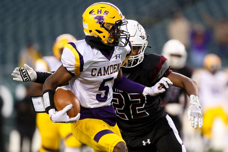 Alijah Clark (5) of Camden High School says he will play football in college at Rutgers.