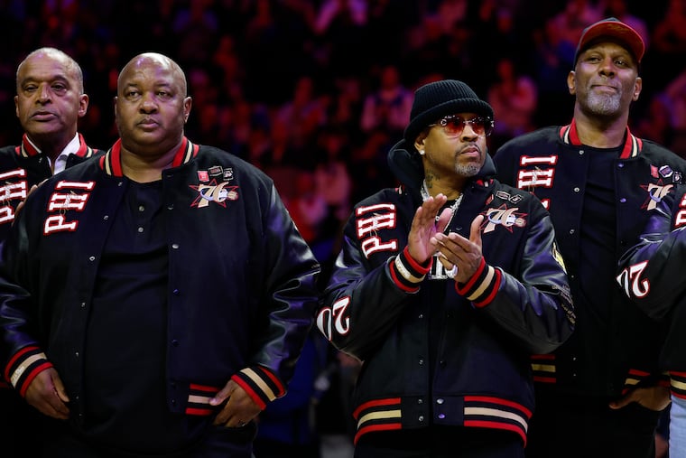 Former Sixers guard Allen Iverson with former teammates Eric Snow and George Lynch (right) during the 25th anniversary NBA finals team during a half time ceremony of the Sixers and New Orleans Pelicans game on Saturday, January 31, 2026 in Philadelphia.