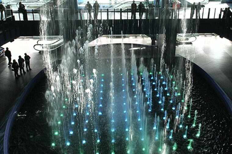 The start of 'The Show', an hourly water show at The Pier. Photo taken at The Pier, at Caesars Hotel & Casino, Atlantic City. (David M Warren / Inquirer)