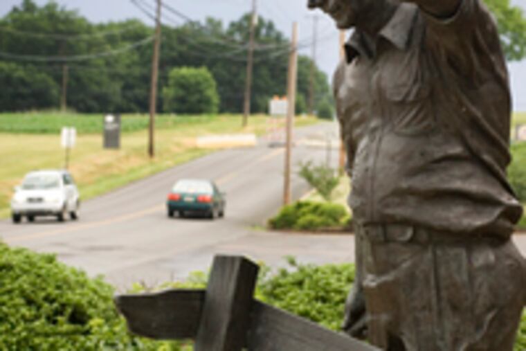 At an entrance to the plant in Hatfield is a statue of company founder John C. Clemens with a pig.